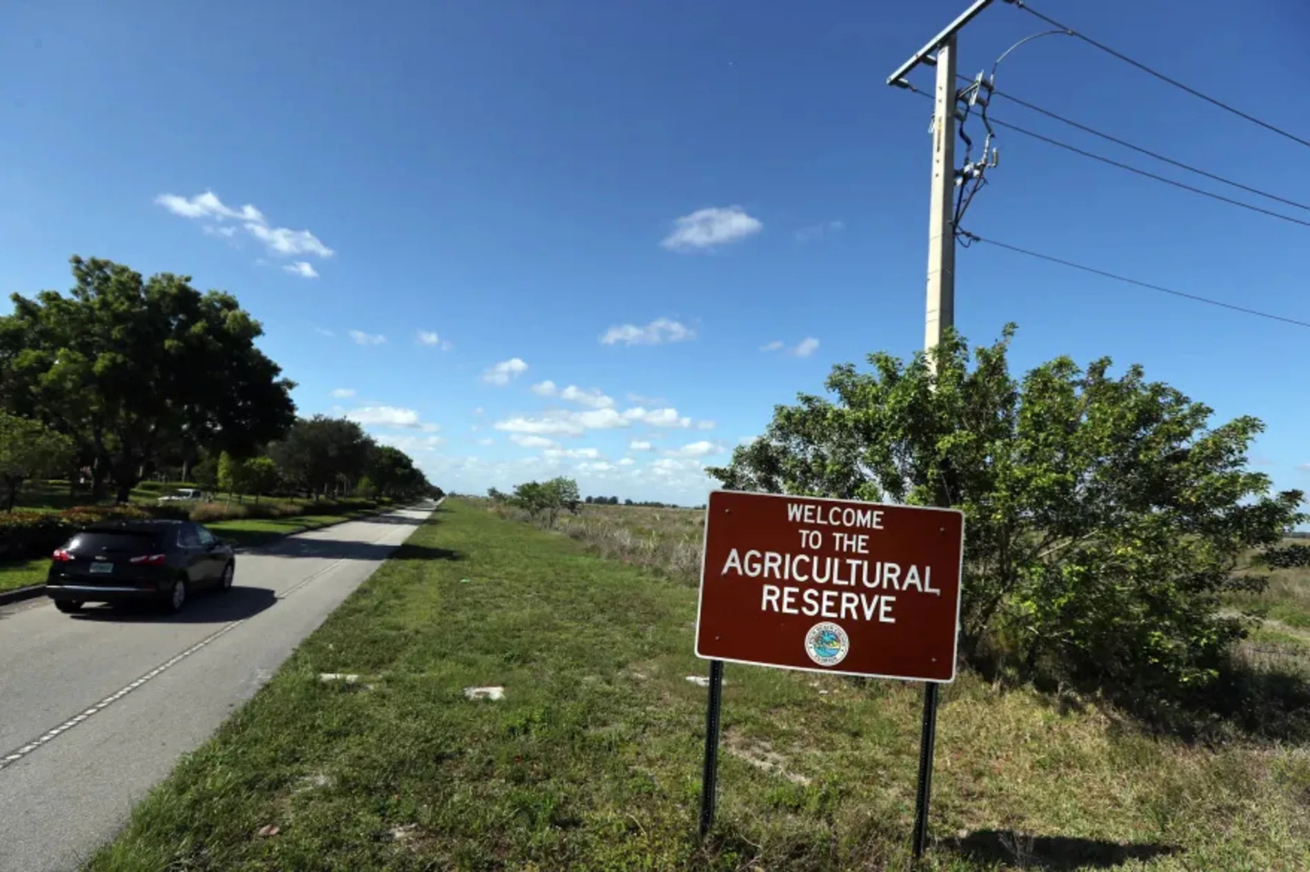 Roadside sign reading "Welcome to the Agricultural Reserve" in Palm Beach County, Florida